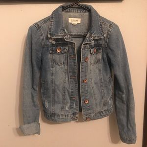 Distressed jean jacket
